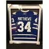 Image 1 : AUSTON MATTHEWS AUTOGRAPHED MAPLE LEAFS JERSEY (FRAMED 34" X 42") JSA COA
