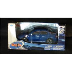 Maisto 1:43 Scale Blue Die-Cast Car