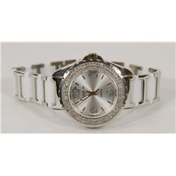 AKRIBOX XXIV WHITE WATCH WITH JEWELS AROUND FACE.