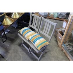 TWO PAINTED FOLDING CHAIRS WITH CUSHIONS