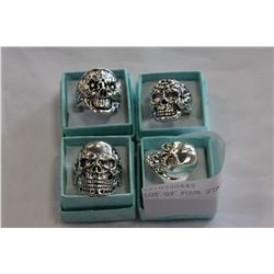 LOT OF FOUR STAINLESS RINGS