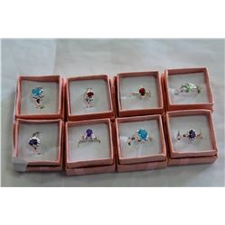 LOT OF EIGHT DINNER RINGS