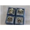 Image 1 : FOUR STAINLESS STEEL BIKER RINGS