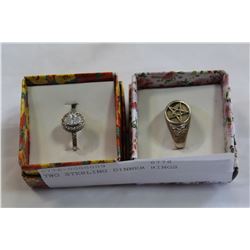 TWO STERLING DINNER RINGS