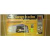 Image 1 : Garage-in-a-box Shelter Logic 12ftx20ftx8ft 1630cu ft of storage shelter auger set up tools included