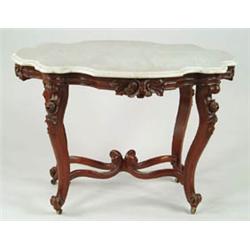 Lot# 31  GOOD VICTORIAN CARVED WALNUT TURTLE TOP MARBLE TOP CENTER TABLE.  