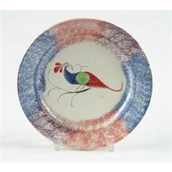 Lot# 47  THREE COLOR RAINBOW SPATTERWARE PEAFOWL PATTERN PLATE.  