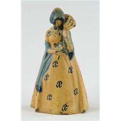Lot# 79  COLONIAL LADY DOORSTOP.  