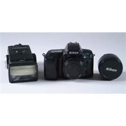 Lot# 104  CAMERA: NIKON N70 CAMERA OUTFIT.  