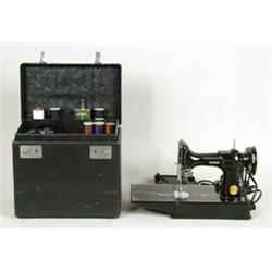 Lot# 194  SINGER PORTABLE ELECTRIC SEWING MACHINE.  