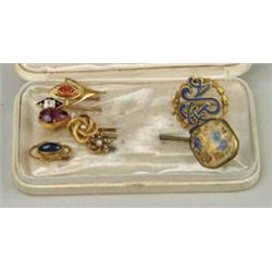 Lot# 280  NINE STICK PINS.  