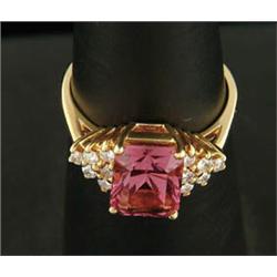 Lot# 290  14K YELLOW GOLD DIAMOND AND RASPBERRY SPINEL RING.  