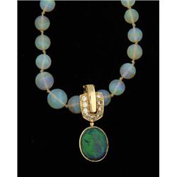 Lot# 292  OPAL, DIAMOND AND 14K YELLOW GOLD NECKLACE.  