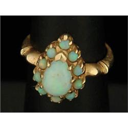 Lot# 293  10K YELLOW GOLD AND OPAL RING.  