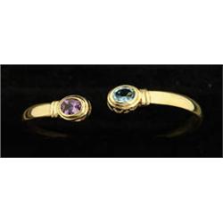 Lot# 296  AMETHYST AND BLUE TOPAZ 14K BANGLE BRACELET.  