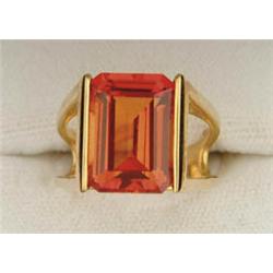 Lot# 303  10K YELLOW GOLD PADPARADSCHA RING.  