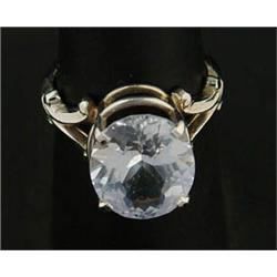 Lot# 309  14K WHITE GOLD AND COLORLESS SAPPHIRE RING.  