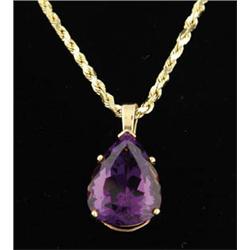 Lot# 315  YELLOW GOLD NECKLACE WITH AMETHYST AND GOLD ENHANCER.  