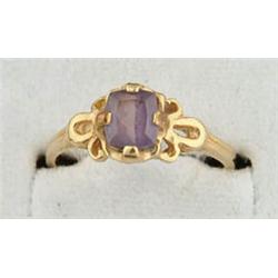 Lot# 317  14K YELLOW GOLD AND ALEXANDRITE RING.  