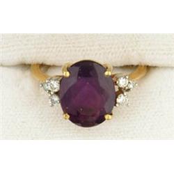 Lot# 318  AMETHYST DIAMOND AND 18K YELLOW GOLD RING.  