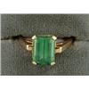 Image 1 : Lot# 322  14K YELLOW GOLD AND SYNTHETIC EMERALD RING.  