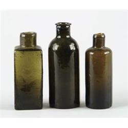 Lot# 385  LOT OF THREE SMALL GREEN BOTTLES.  