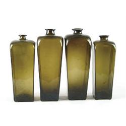 Lot# 390  LOT OF FOUR TAPERED GIN BOTTLES.  