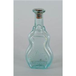 Lot# 399A.  AQUA COCOA-NUT OIL BOTTLE.  