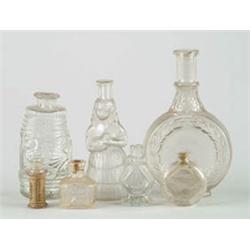 Lot# 399N.  LOT OF THIRTEEN SMALL CLEAR BOTTLES.  