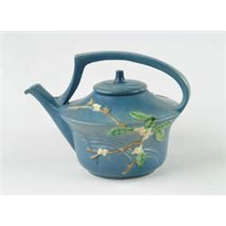 Lot# 410  ROSEVILLE TEAPOT IN PRIMROSE PATTERN. Roseville teapot is blue with arched handle, white f
