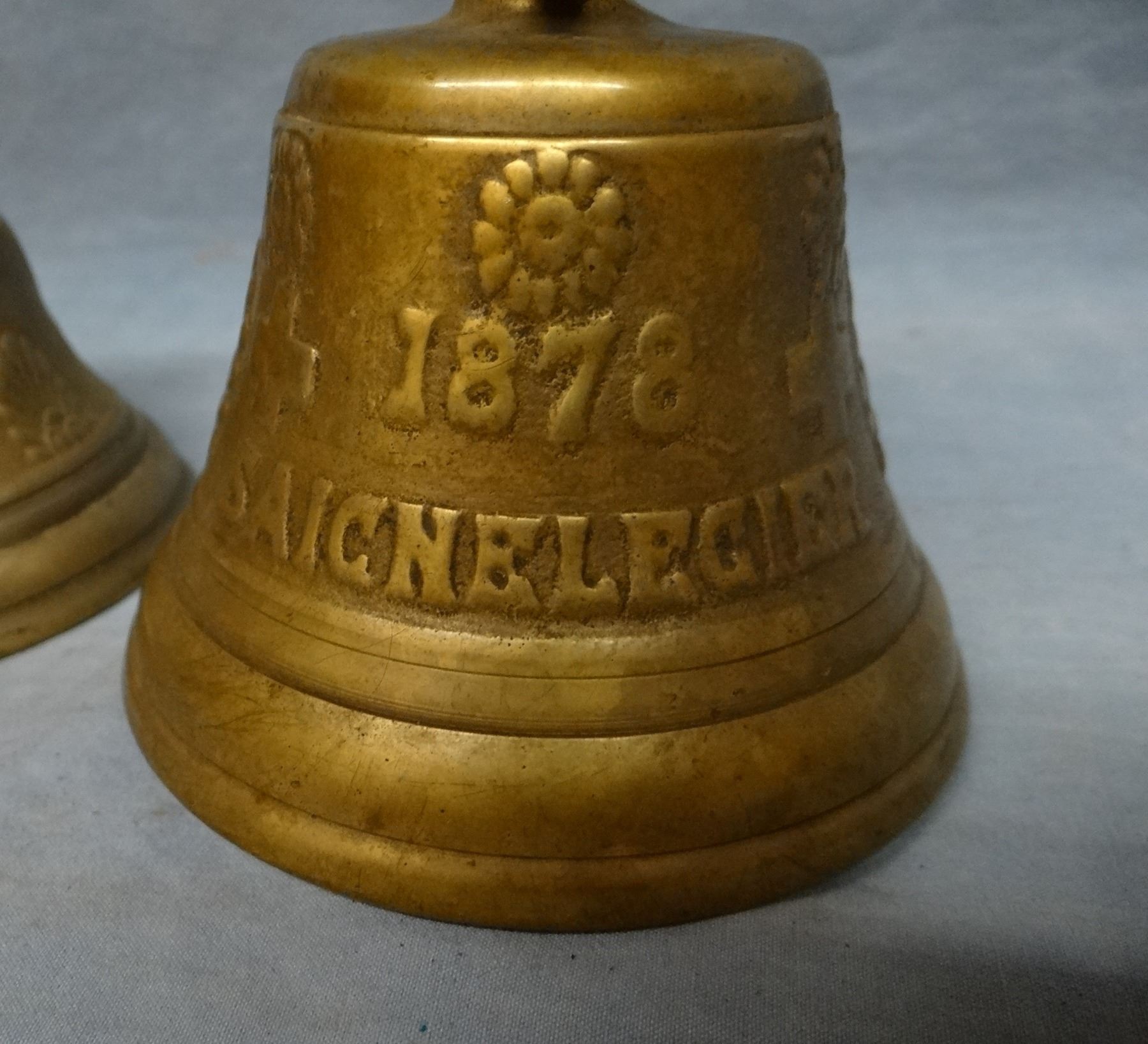2 brass Swiss cow bells