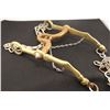 Brass and copper curb bit, rein chains