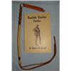 Russell, C. M. book, Rawhide Rawlins, 1946; and Virginia Snook's braided leather riding quirt
