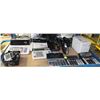 Image 1 : SHELF OF CALCULATORS, STAPLERS, AND MORE