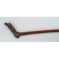 Lot #  542:  CANE: EARLY CARVED WOOD ORIENTAL CANE.