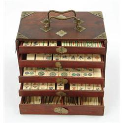 Lot #  543:  CASED IVORY AND WOOD MAH-JONG SET.