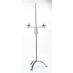 Lot #  557:  IRON AND BRASS FLOOR ADJUSTABLE DOUBLE CANDLE HOLDER.