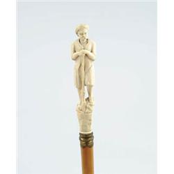 Lot #  586:  CANE: CARVED IVORY ARAB MAN WITH GUN CANE.