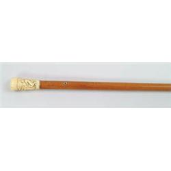 Lot #  588:  CANE: CARVED 18TH CENTURY IVORY AND MALACCA CANE.