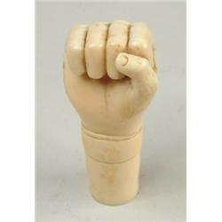 Lot #  590A.:  CARVED IVORY CANE HANDLE IN FIST FORM.