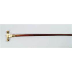 Lot #  591:  CANE: IVORY HAND AND BRASS BARBELL CANE.