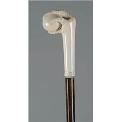Lot #  618C.:  CANE: CARVED IVORY TALON AND EGG CANE.