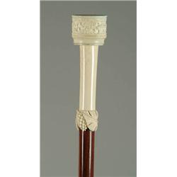 Lot #  628B.:  CANE: CARVED IVORY SILVER DOLLAR CANE.