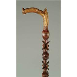 Lot #  634B.:  CANE: CARVED WOOD CANE.