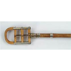 Lot #  703:  CANE: FOLDING SEAT CANE.