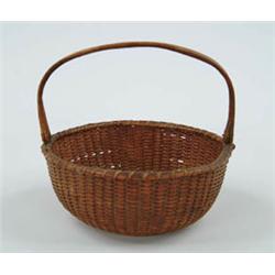 Lot #  771:  ANTIQUE WOODEN HANDLE NANTUCKET BASKET.