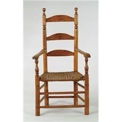 Lot #  780:  EARLY LADDERBACK ARMCHAIR.