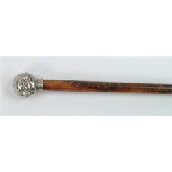 Lot #  811:  CANE: METAL FOUR FACE KNOB CANE.
