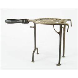 Lot #  860:  TALL ENGLISH BRASS FIREPLACE TRIVET.