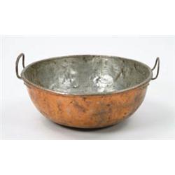 Lot #  928:  TWO HANDLED COPPER DONUT KETTLE.